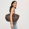 09a1ca1d4c161e08a57fcd5ee0ac98e5e8a542574d69d4aa2268da01b1b223f5.jpg Kaia - Straw Tote